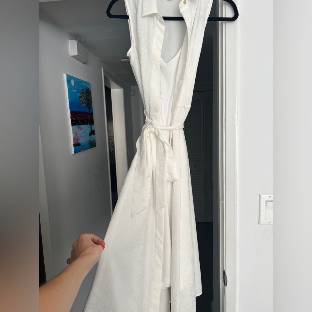 Calvin Klein White dress with white embroidered flowers.